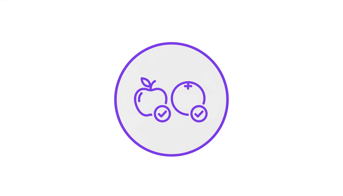 Et eple og en appelsin merket med hake symboliserer veiledet læring